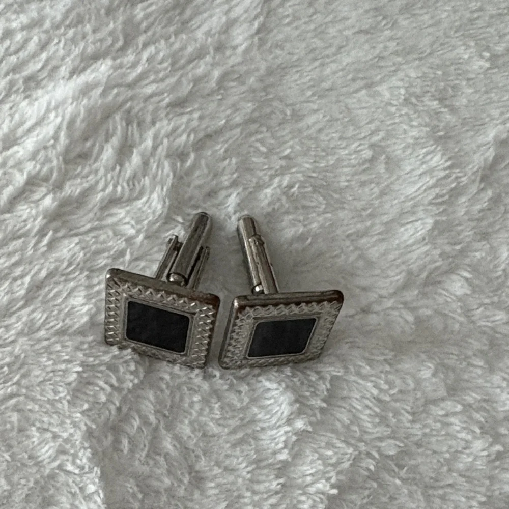 Elegant Silver and Black Cufflinks